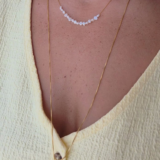 תכשיט עם שורת פנינים